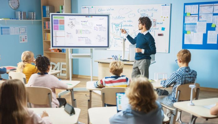 Science Teacher Interact with student